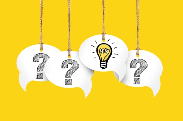 illustration of three text bubbles with questions marks and one with a light bulb 