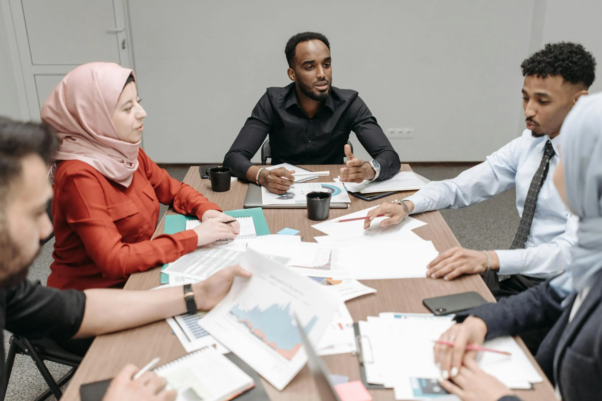 business team reviewing documents together