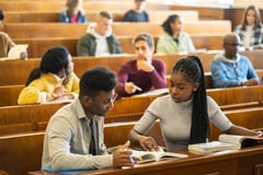 students interacting in lecture hall