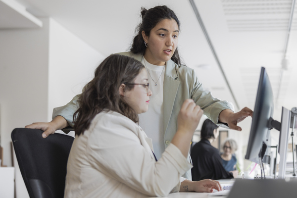 women deciding at computer-1